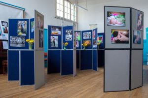 Exhibition boards in use, at a photographic exhibition