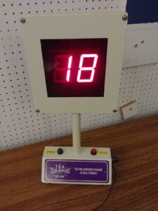 Bingo machine displaying an illuminated number 18