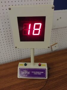 Bingo machine displaying an illuminated number 18